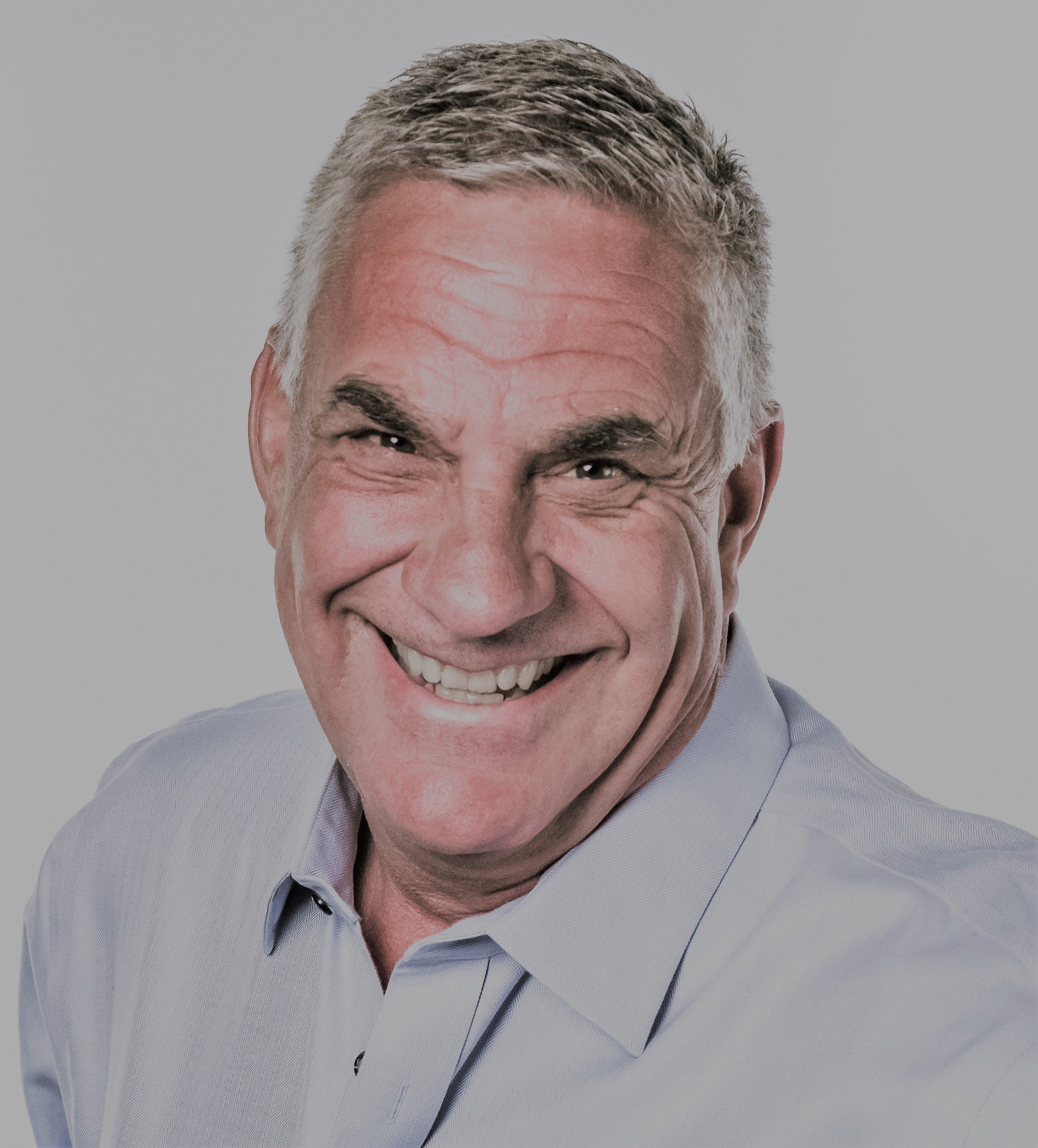 Tom Hollerbach headshot with web filter