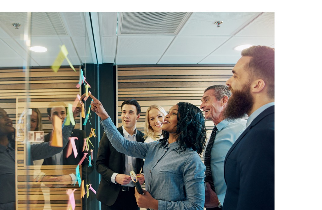cheerful-entrepreneur-team-talking-in-the-office-picture-id851025660.jpg